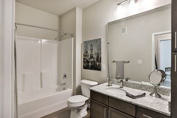 a bathroom with a shower toilet and sink and a mirror  at Aventura at Hawk Ridge, Lake St Louis, 63367